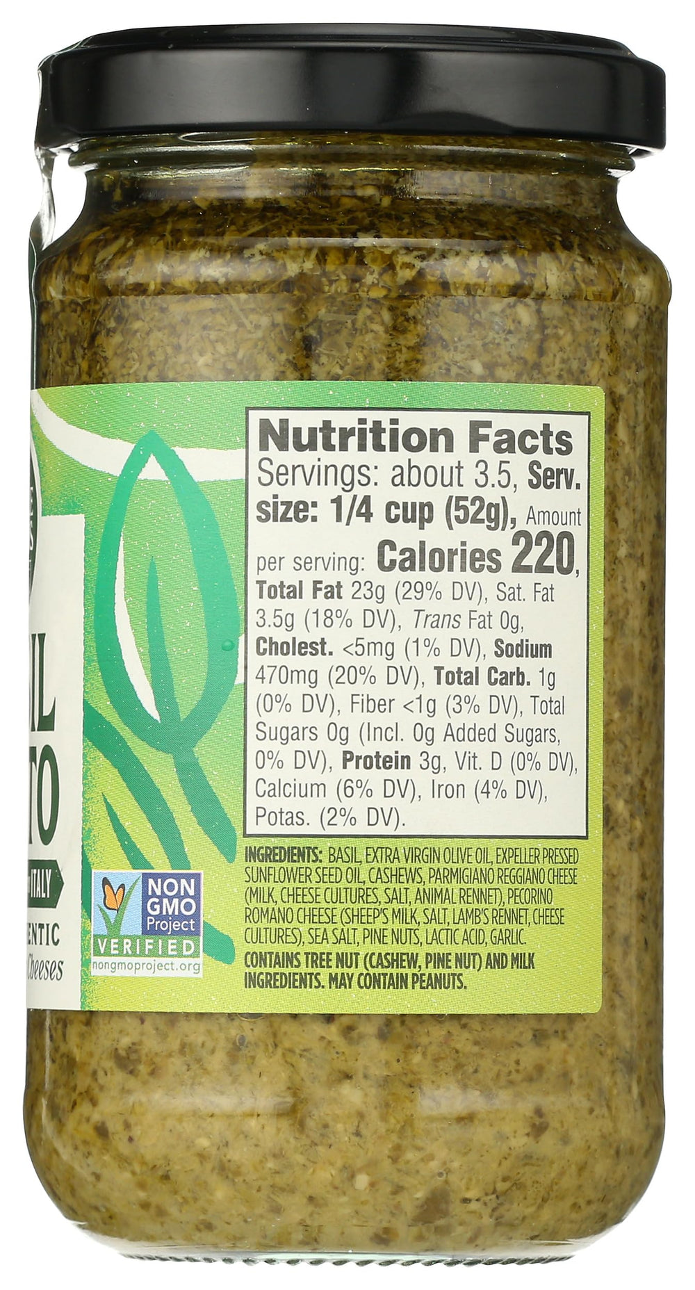 Close-up of Whole Foods Market Basil Pesto ingredients and authentic Italian cheeses.