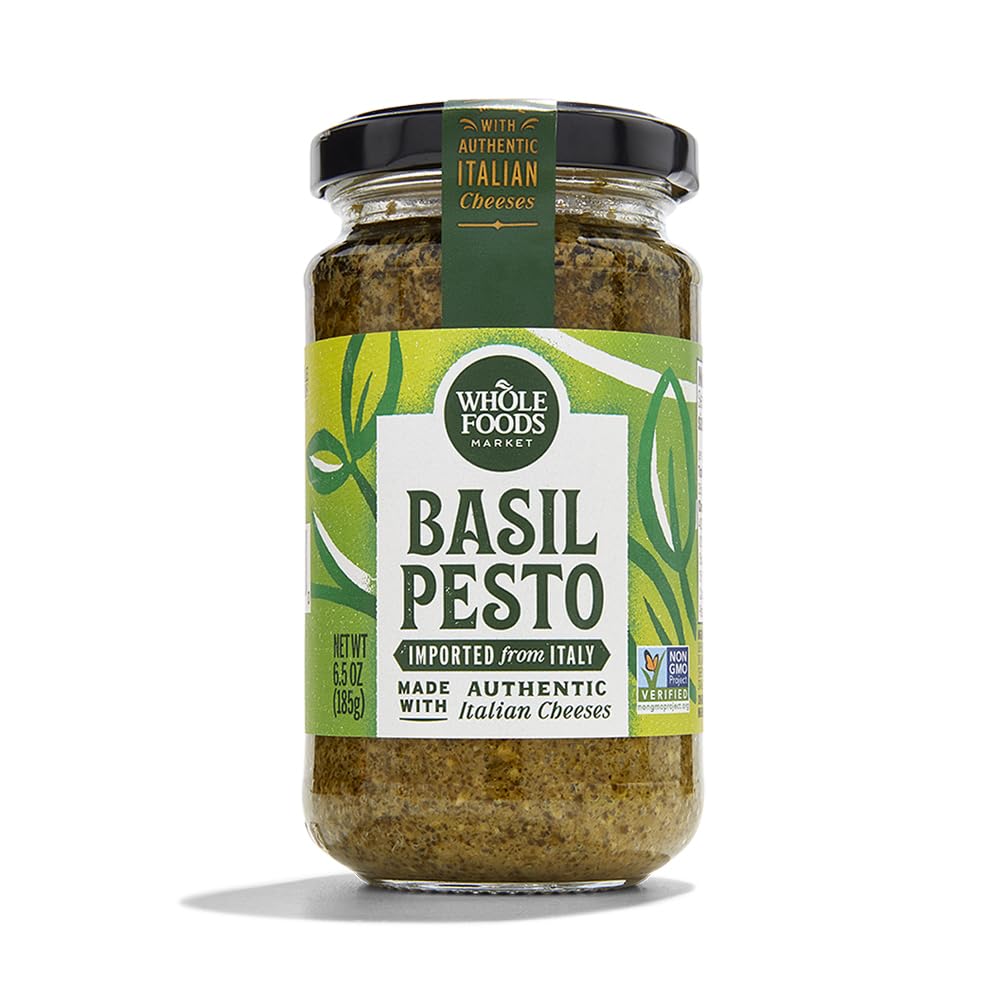 Whole Foods Market Basil Pesto jar with vibrant greens for quick pasta meals.