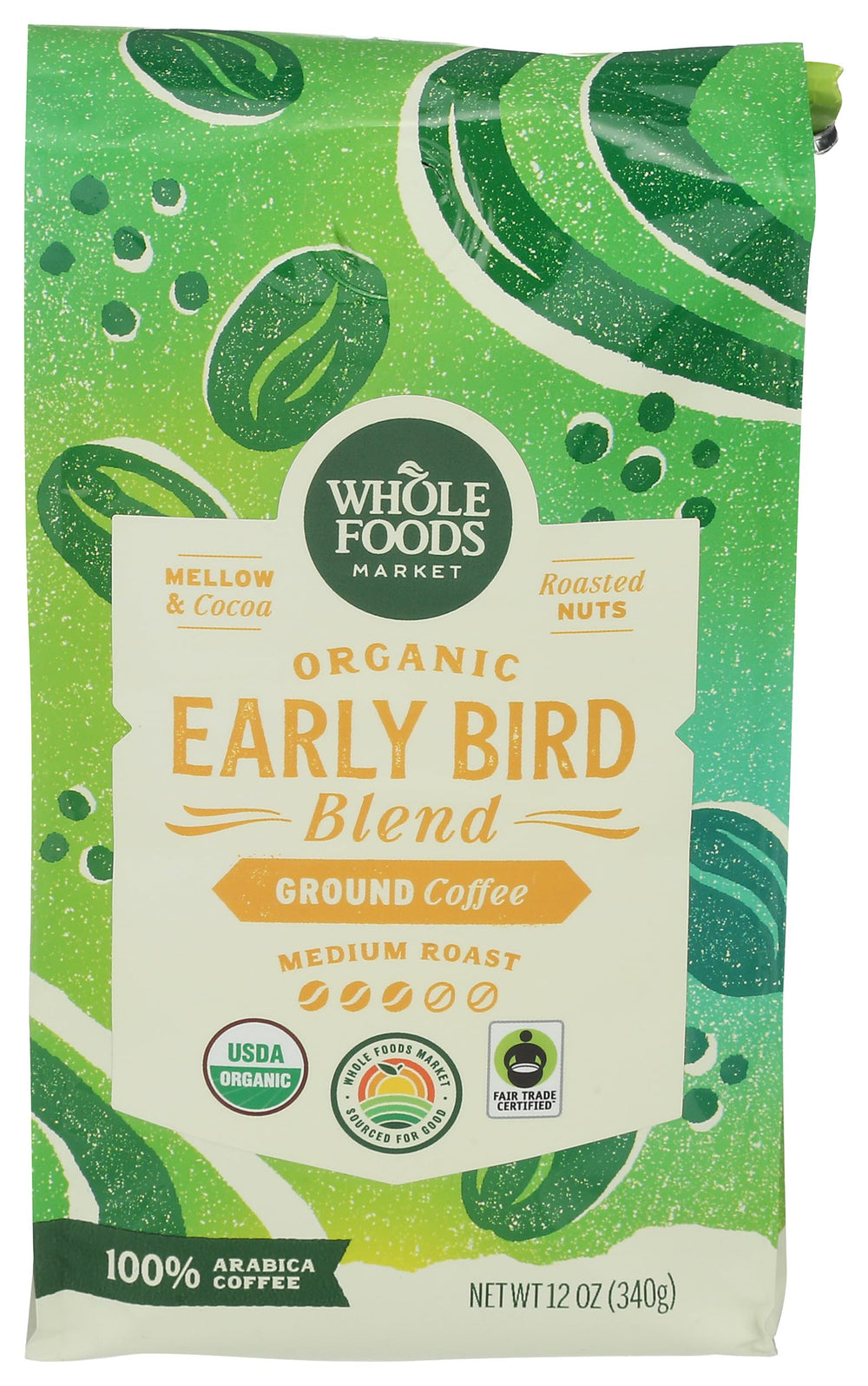 Whole Foods Market Organic Early Bird Blend bag on kitchen counter, ready for quick mornings.