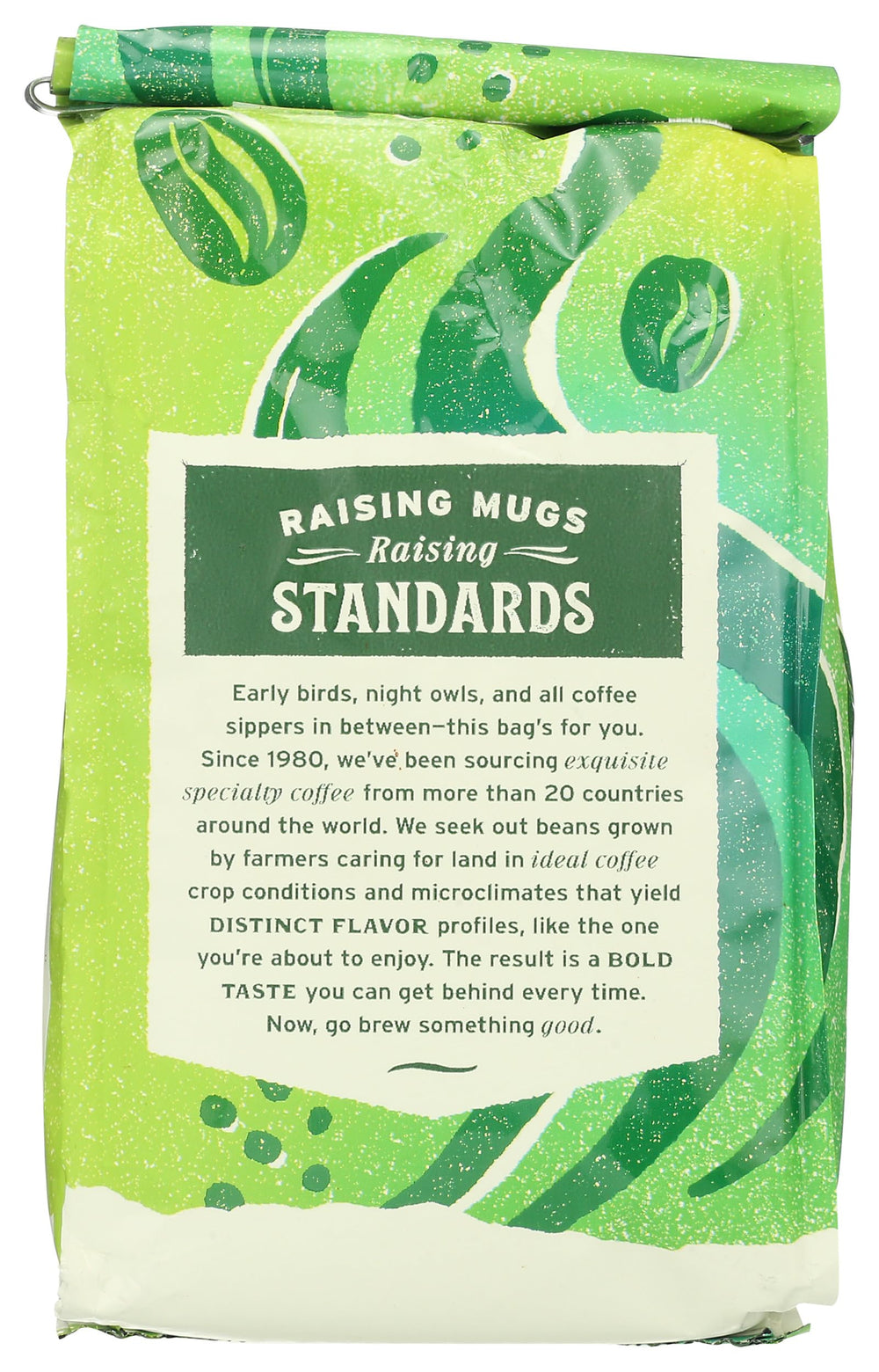 Pouring Whole Foods Market Organic Ground Coffee Dark Italian Roast for a bold morning brew.