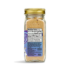 Whole Foods Market umami seasoning bottle pour for savory stews and more.
