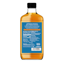 Wholesome Blue Agave Nectar being poured into a glass, ideal for cocktails
