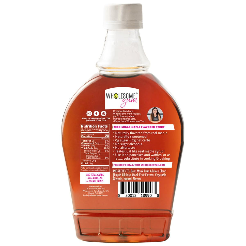Wholesome Yum Zero Sugar Maple Syrup on a stack of pancakes with drizzle.