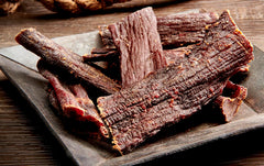 Wild Bill's 15 oz jerky in box, ideal for sharing on road trips