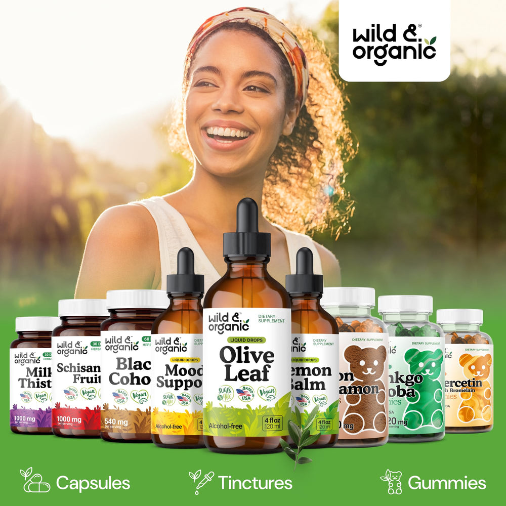 Wild & Organic Olive Leaf Drops label close-up emphasizes vegan and sugar-free features.