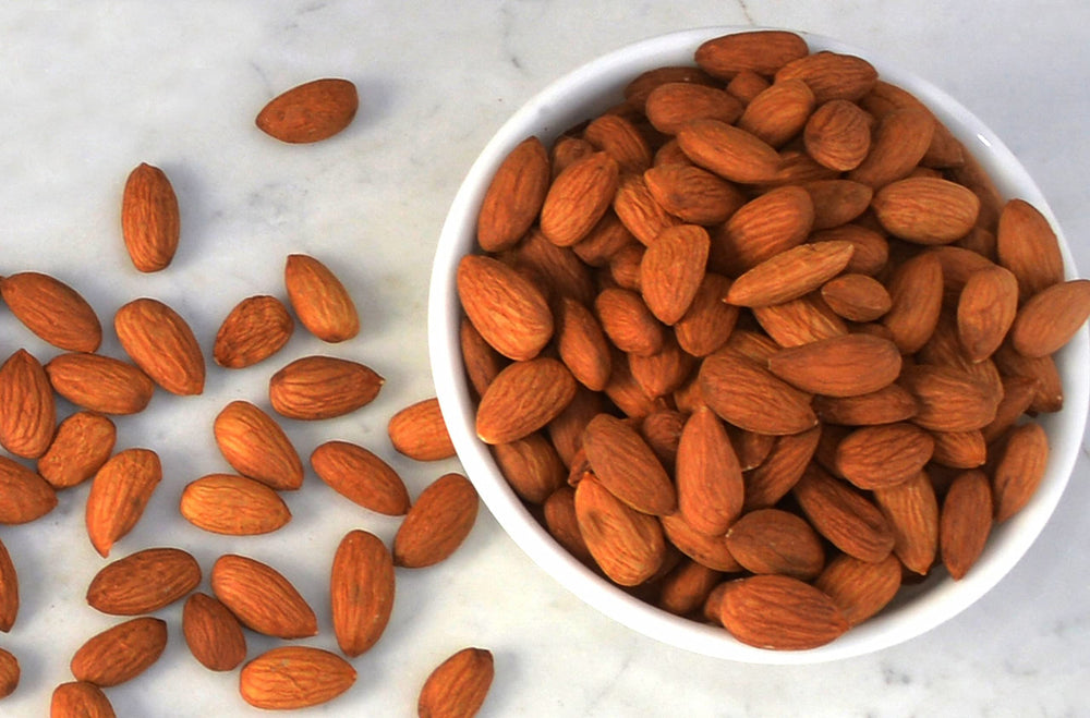 Wild Soil Terra Preta almonds served in bowl inviting healthy snacking options