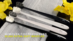 Bamboo charcoal bristles provide ultra-soft contact for sensitive teeth