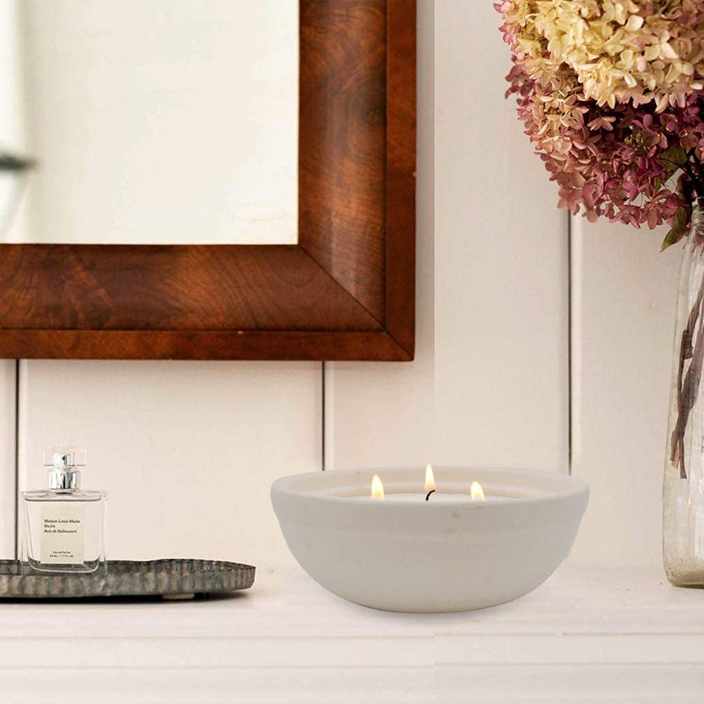 Winbattle citronella candle on a patio for outdoor lighting and atmosphere