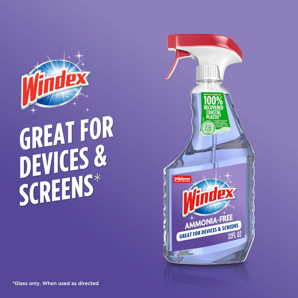 Windex glass cleaner on shower door highlighting residue-free, glossy surface.