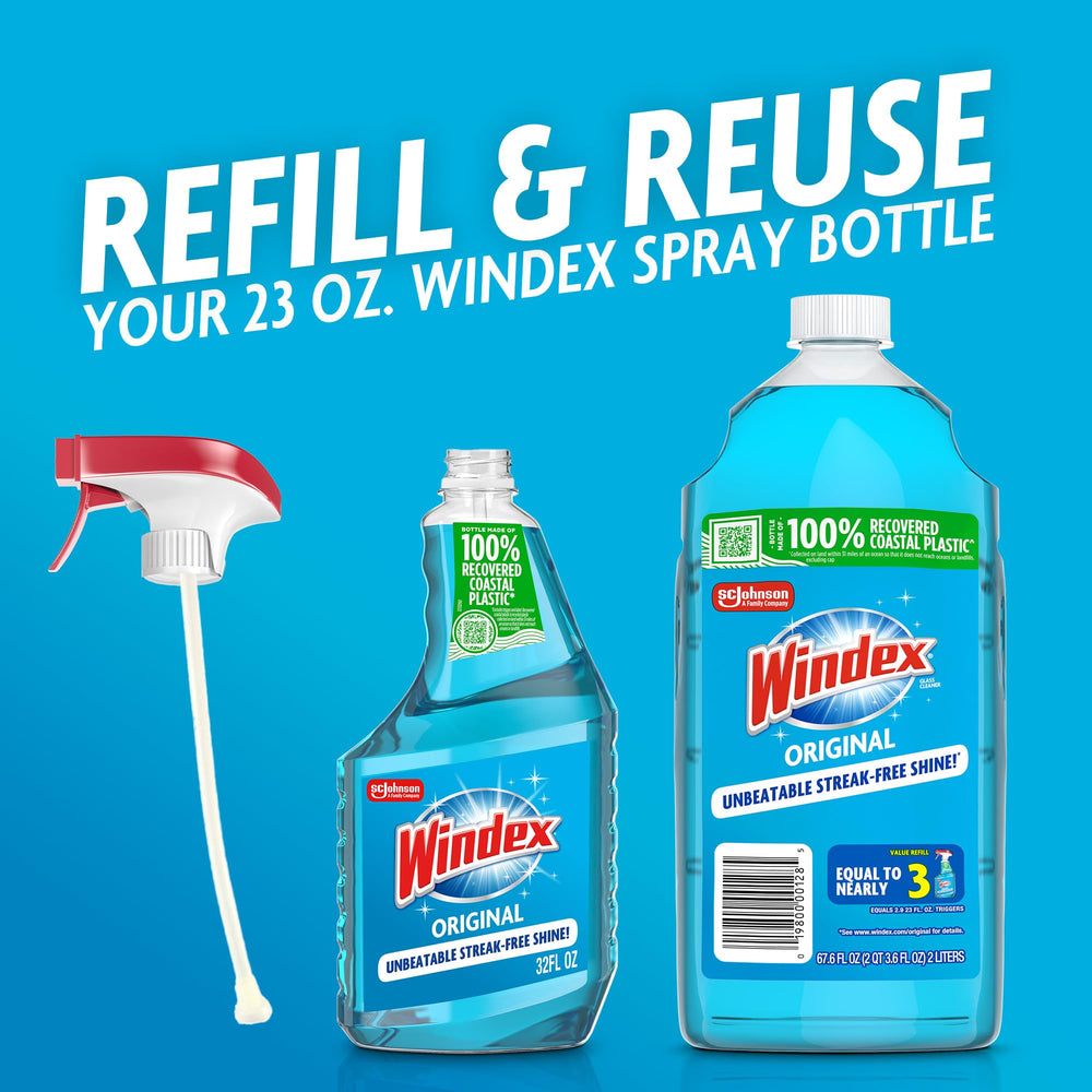 Windex Original Blue spray action on glass surface for streak-free shine