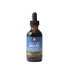 WishGarden Kick-Ass Immune bottle in focus, vegan herbal immunity support.