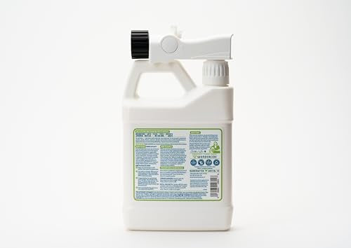 Wondercide Outdoor Pest Control Spray being sprayed on lawn to deter mosquitoes.