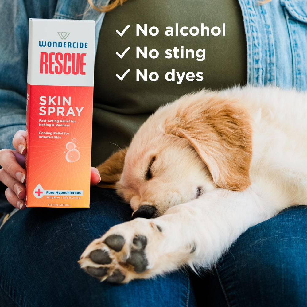 Wondercide Rescue Skin Spray on face protecting eyes while soothing irritation