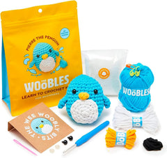The Woobles crochet kit for beginners: Pierre the Penguin ready for your first stitch adventure.