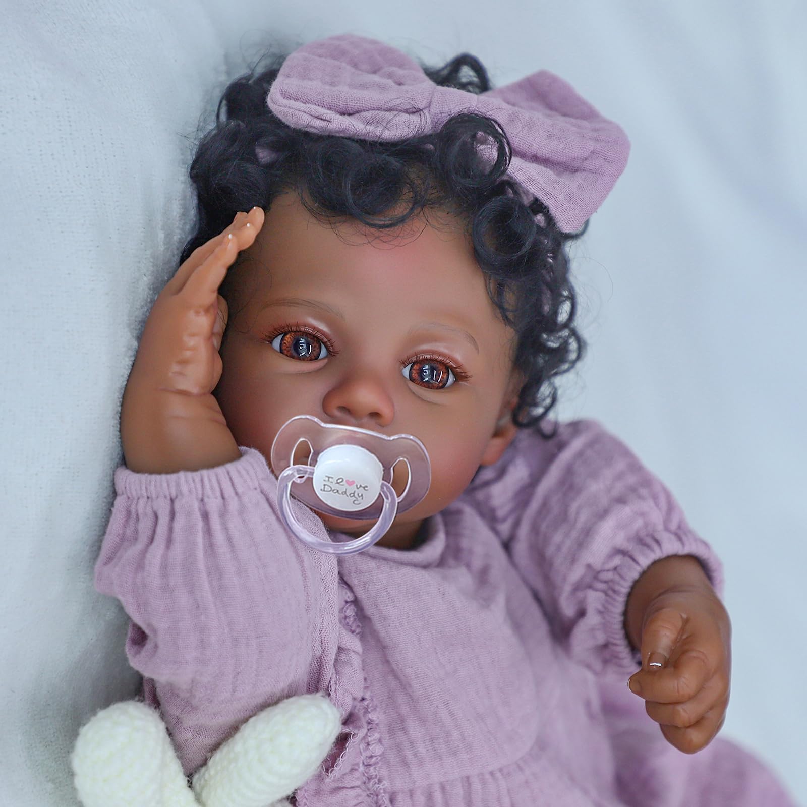 WOOROY tiny hands and feet with wrinkled soles enhance believability.