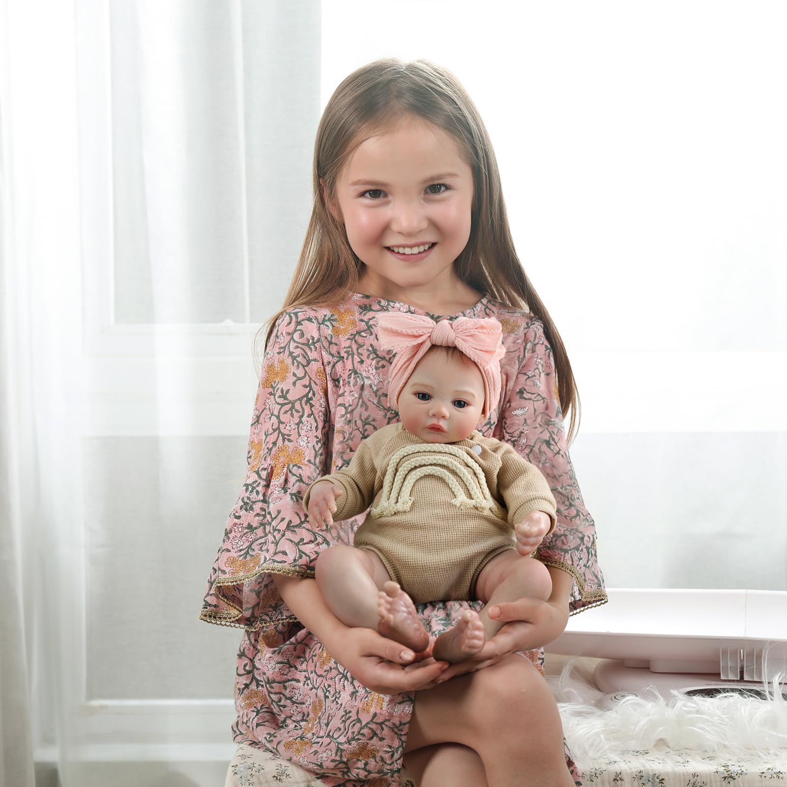 WOOROY tan knit outfit with rainbow stripes and pink bow adds charm.