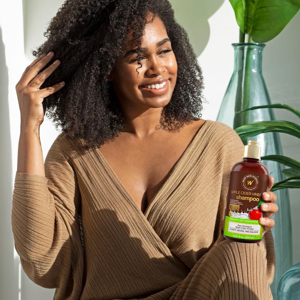 Shower setup with WOW shampoo bottle emphasizes easy daily cleansing