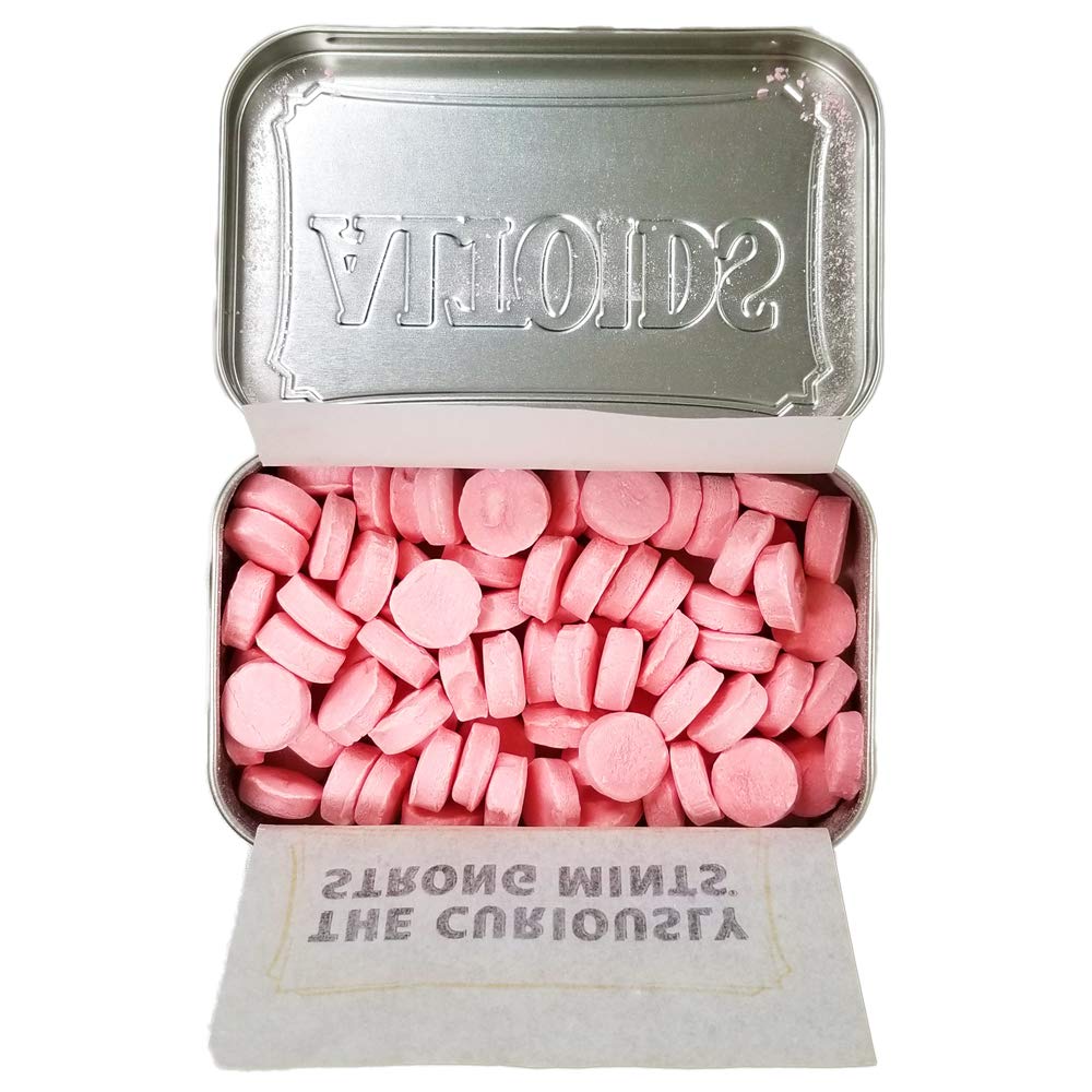 Wrigley's Altoids Cinnamon mints close-up highlighting spicy-sweet aroma and freshness