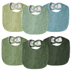 Wrrernsin muslin baby bib front view with soft organic cotton and neutral colors.