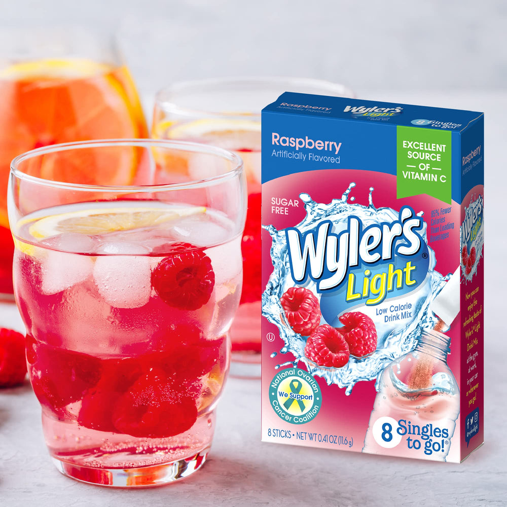 Raspberry Wyler's Light powder dissolving in water bottle