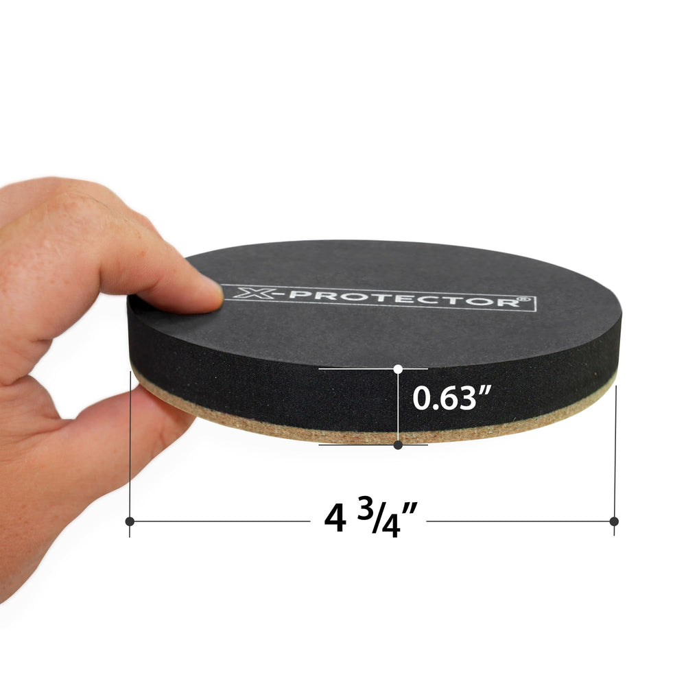 X-Protector heavy-duty felt sliders close-up on wood floor.