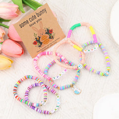 XMITHJLS colorful clay bead bracelets on elastic cord offer comfortable all-day wear.