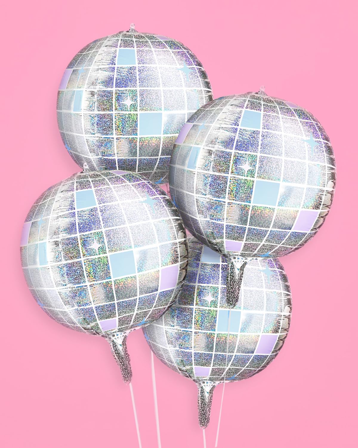 xo, Fetti groovy birthday party decor with disco ball balloons.