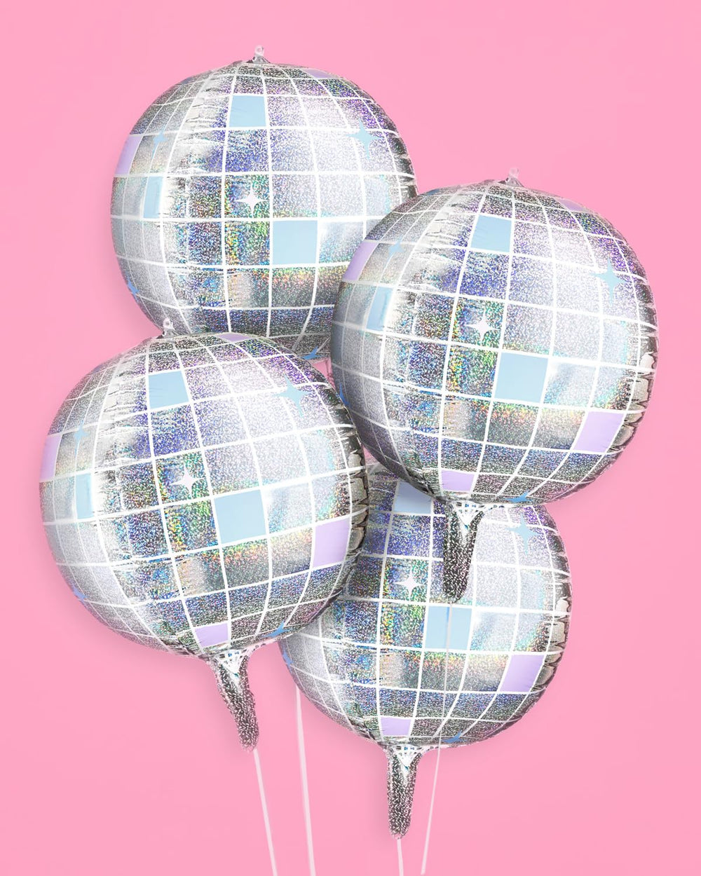 xo, Fetti groovy birthday party decor with disco ball balloons.