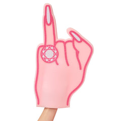 xo Fetti XL engaged foam finger on club table sparks bachelorette laughs.