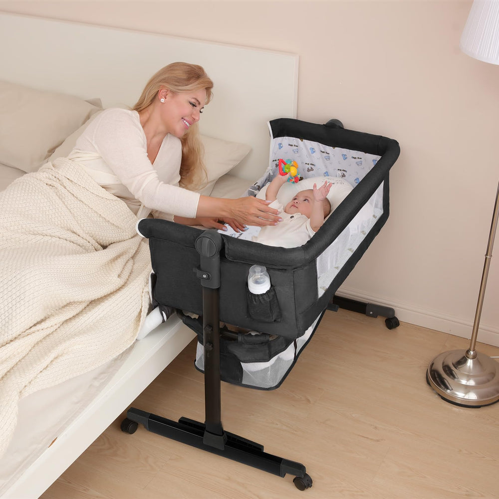 YADAQE Baby Cradle with a breathable mosquito net and waterproof layer for a dry sleeping surface.