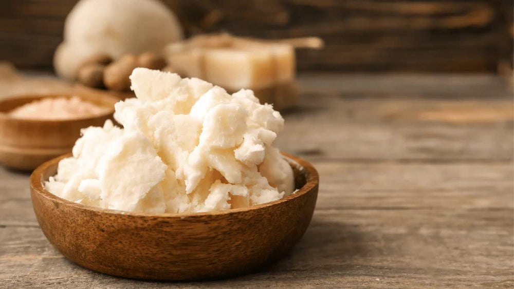 Yajna mango butter on hair ends, adding moisture and shine.