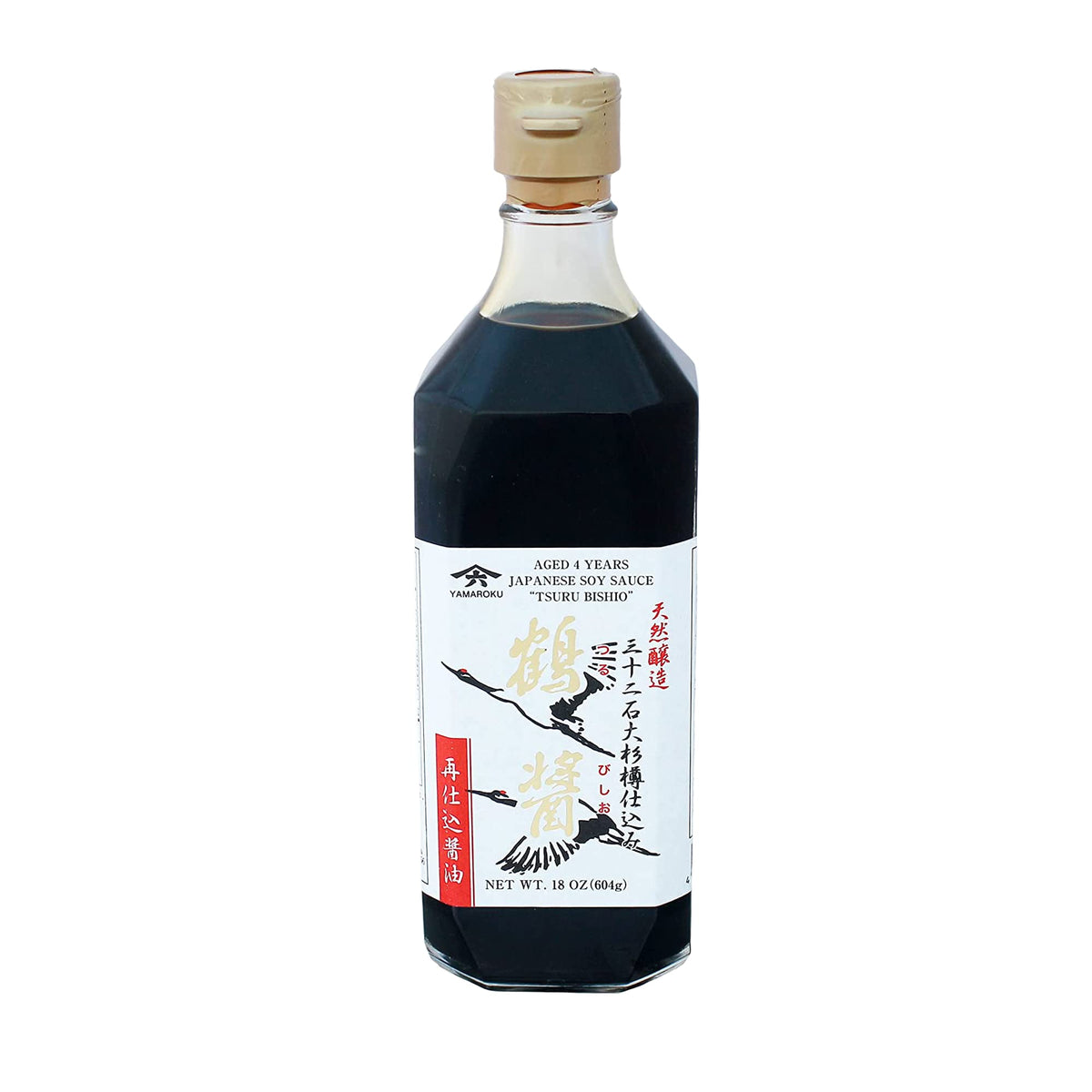 Pouring Yamaroku Tsurubishio bottle for rich umami on sushi