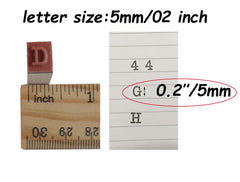 Yansanido number stamps provide compact 0.2 inch digits for labeling