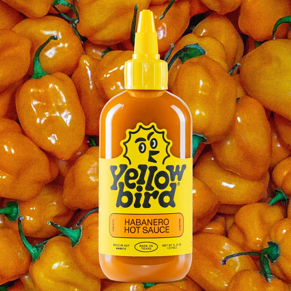 Yellowbird pantry pack two bottles offers convenient, ready-to-use heat for family meals.
