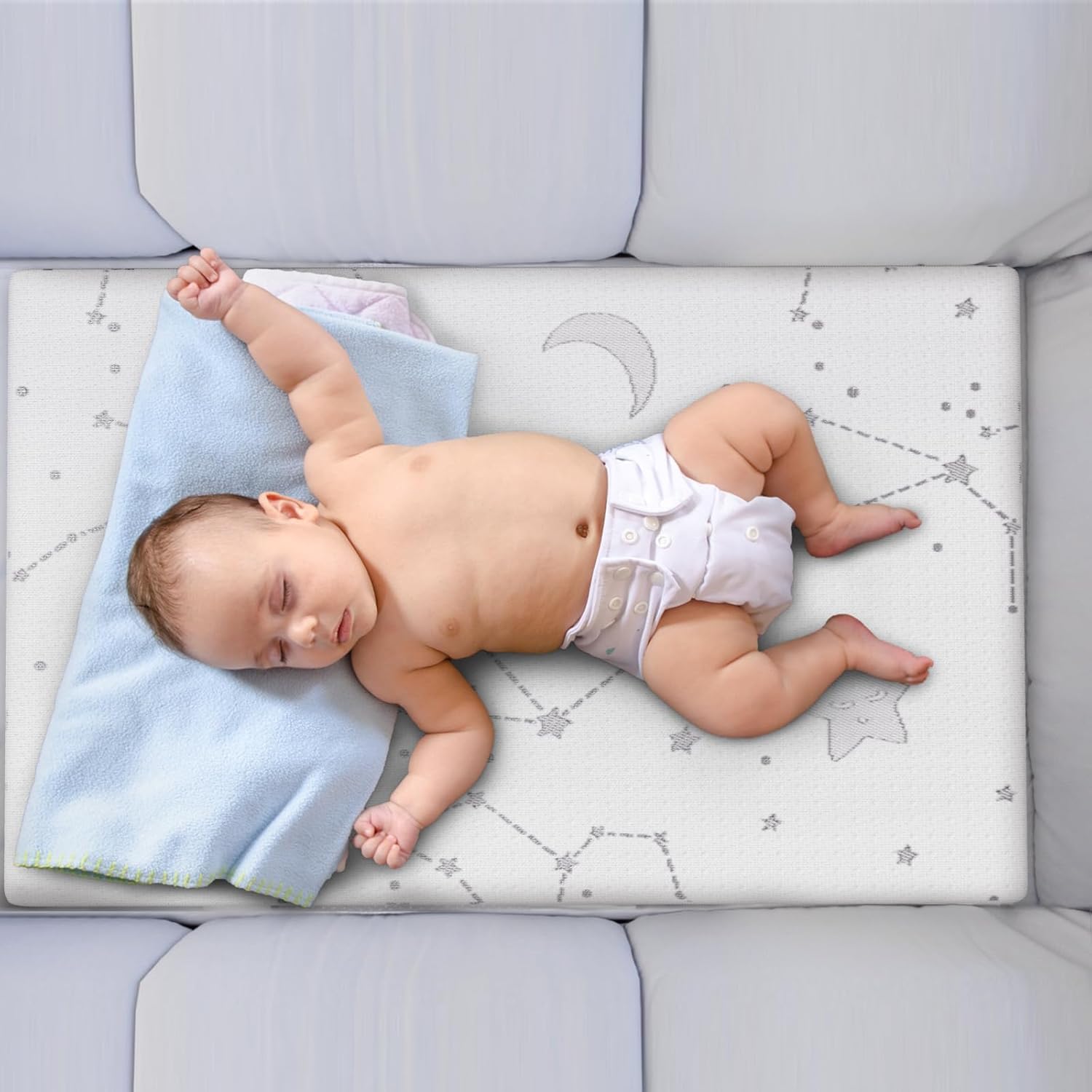 YENING pack and play topper creates a cozy play area for baby.