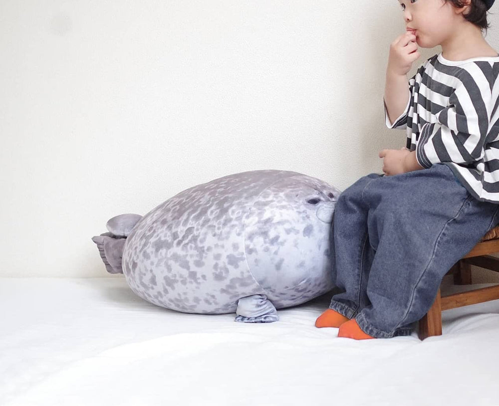 YESGIRL seal plush face detail showcasing realistic eyes for charm.