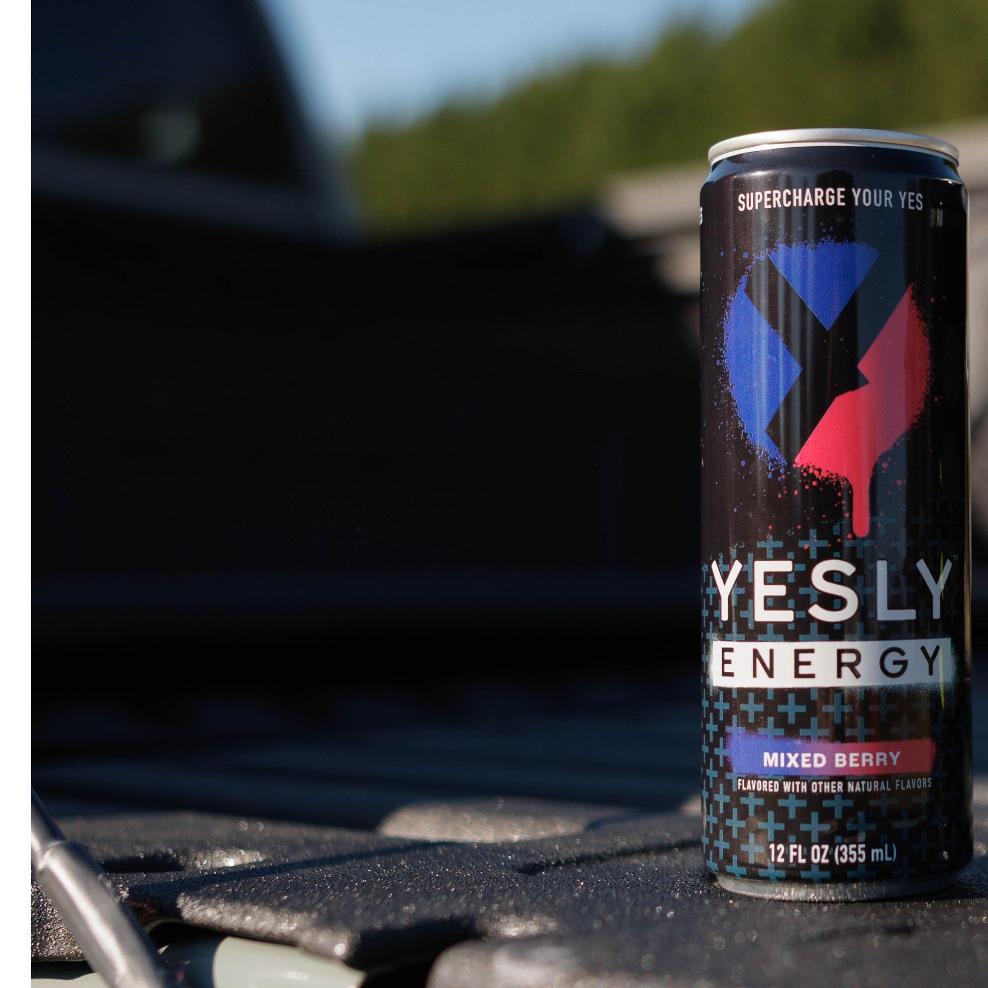 Yesly Energy mixed-berry cans in carton highlight convenient 12-pack.
