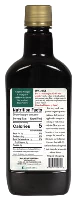 Yoder Naturals elderberry juice glass highlighting seasonal wellness.