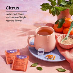 Hot cup of Yogi Sweet Tangerine with steam and citrus aroma