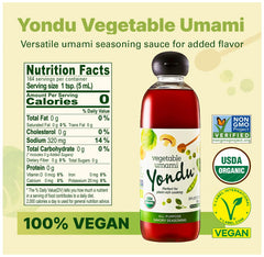 Pouring Yondu essence into a stir-fry for savory depth.