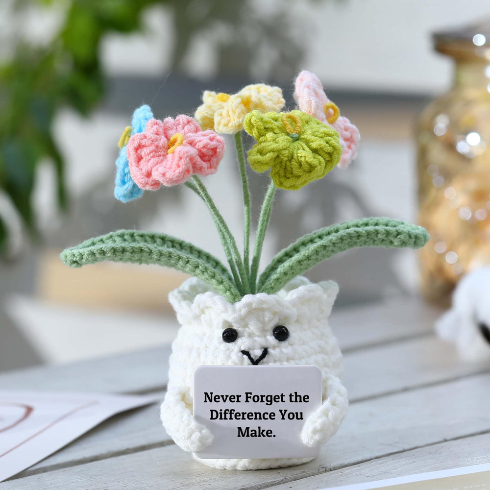 YOOJEE Forget-Me-Not crochet potted plant offers everlasting decor beyond real blooms.