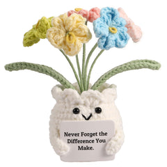 YOOJEE Forget-Me-Not crochet flower pot on full display adds a charming desk accent.