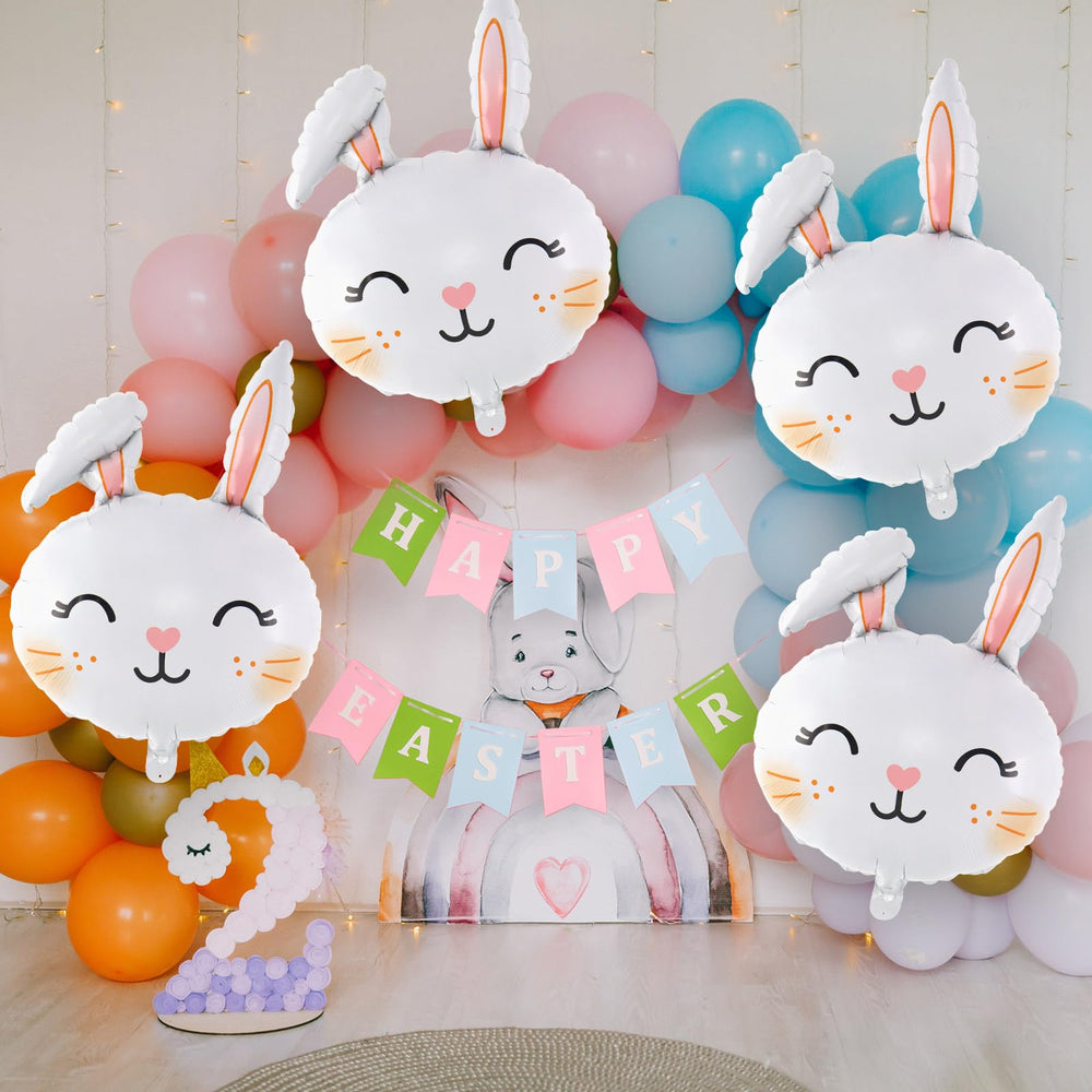 YOTHORN rabbit balloon serves as dining table centerpiece or photo backdrop.