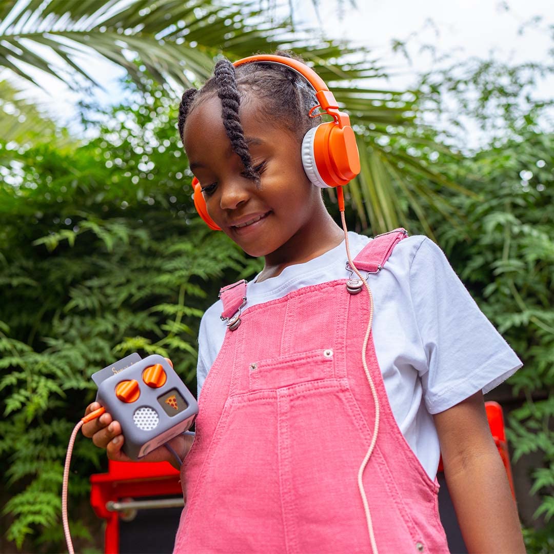 YOTO device in use with audio cards for screen-free play.