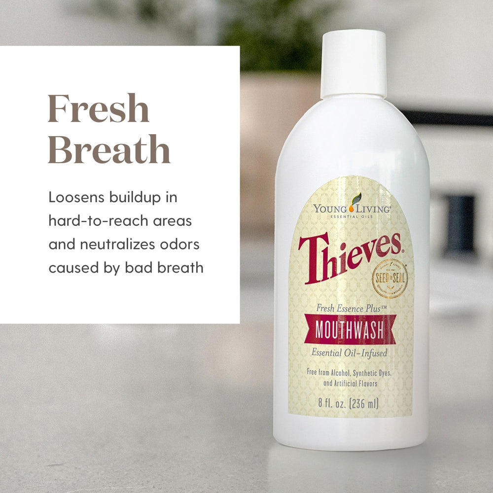Thieves Fresh Essence mouthwash in a glass demonstrates refreshing, non-irritating rinse.