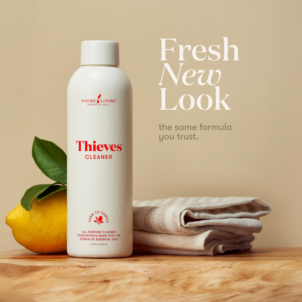 Young Living Thieves Cleaner label closeup highlights plant-derived formula and seed-to-seal sourcing.