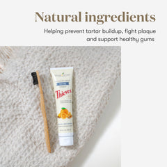 Young Living Thieves Whitening Toothpaste packaging showcases premium ingredients.