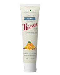 Young Living Thieves Whitening Toothpaste tube highlights fluoride-free whitening potential.