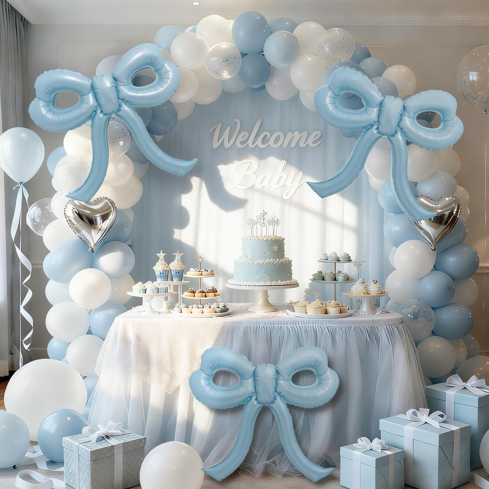 YTHETM blue bow balloon used as a photo booth prop.
