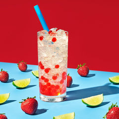 YULU FOODS strawberry popping boba pearls used as a topping on waffles.